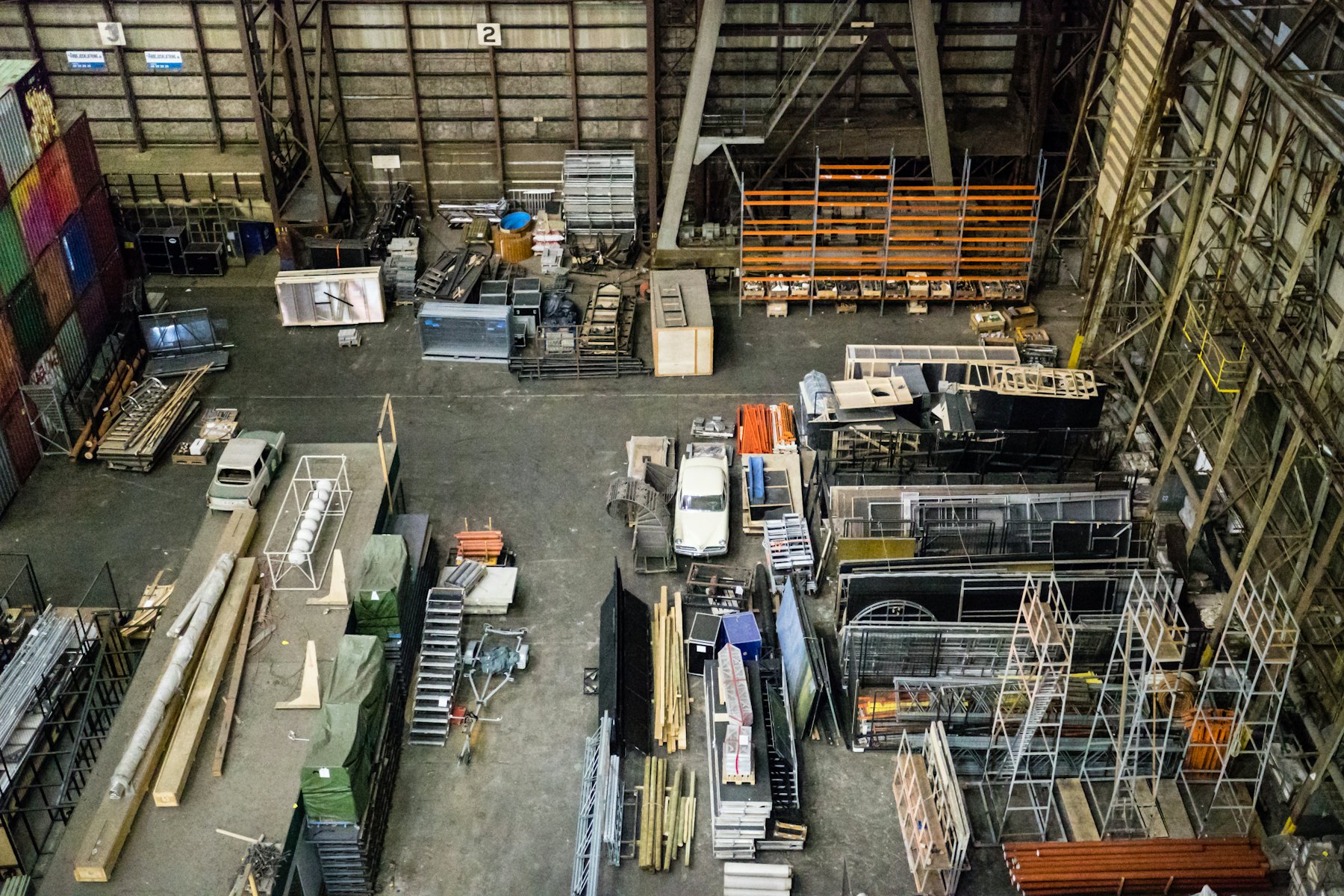 Metal fabrication workshop with steel materials and production area